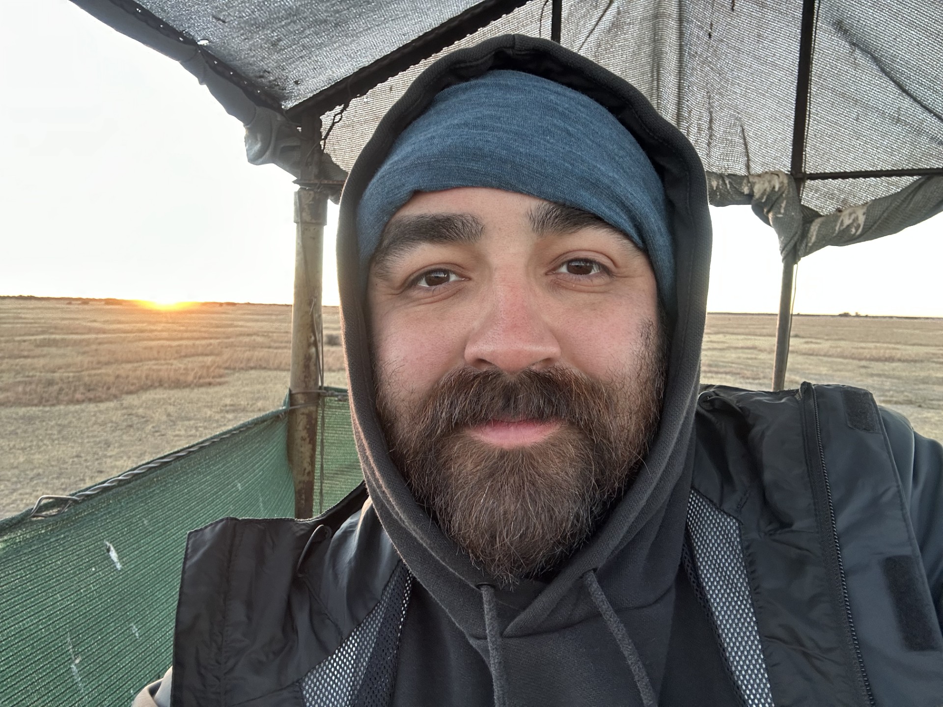 Student with hat and beard outside