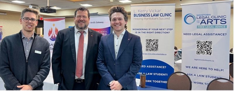 Cole Hutchison (2L), Hon. Glen Simard (Minister of Municipal & Norther Relations), Donald Plant (2L).