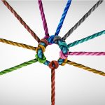 Various colours of rope come together in a circle