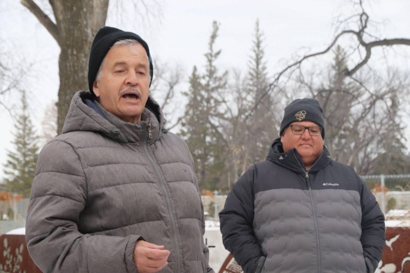 Dr. Brian Rice speaking beside Dr. Dan Henhawk during an outdoor education class