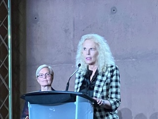 Sachs giving opening remarks at the Sunday reception. The symposium was a living tribute to two amazing lawyers, Justice Harriet Sachs and her partner the late Clayton Ruby.