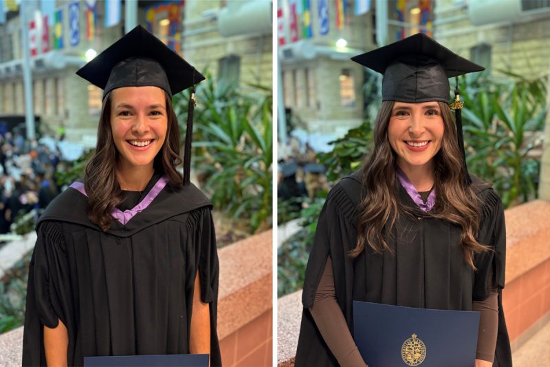 Hailee Morisseau and Anna Zrinyi posing in their convocation gowns. 