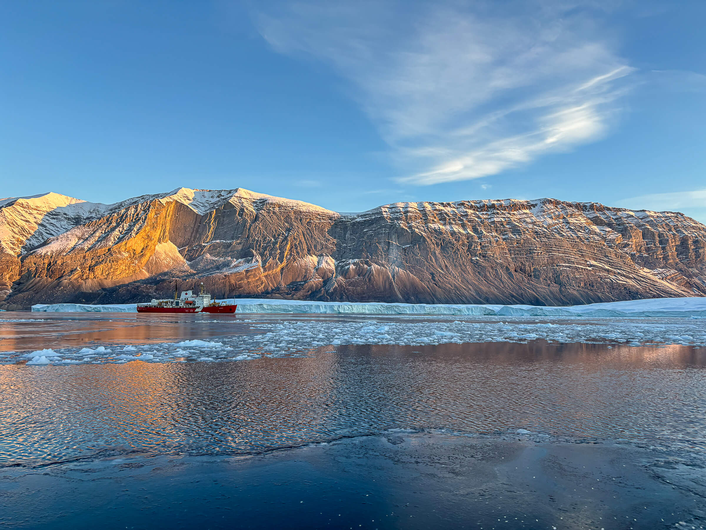 The Amundsen in front of the glacier at the end of Otto Fiord // Photo by Alexander Normandeau
