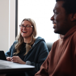 Two students sitting at a table