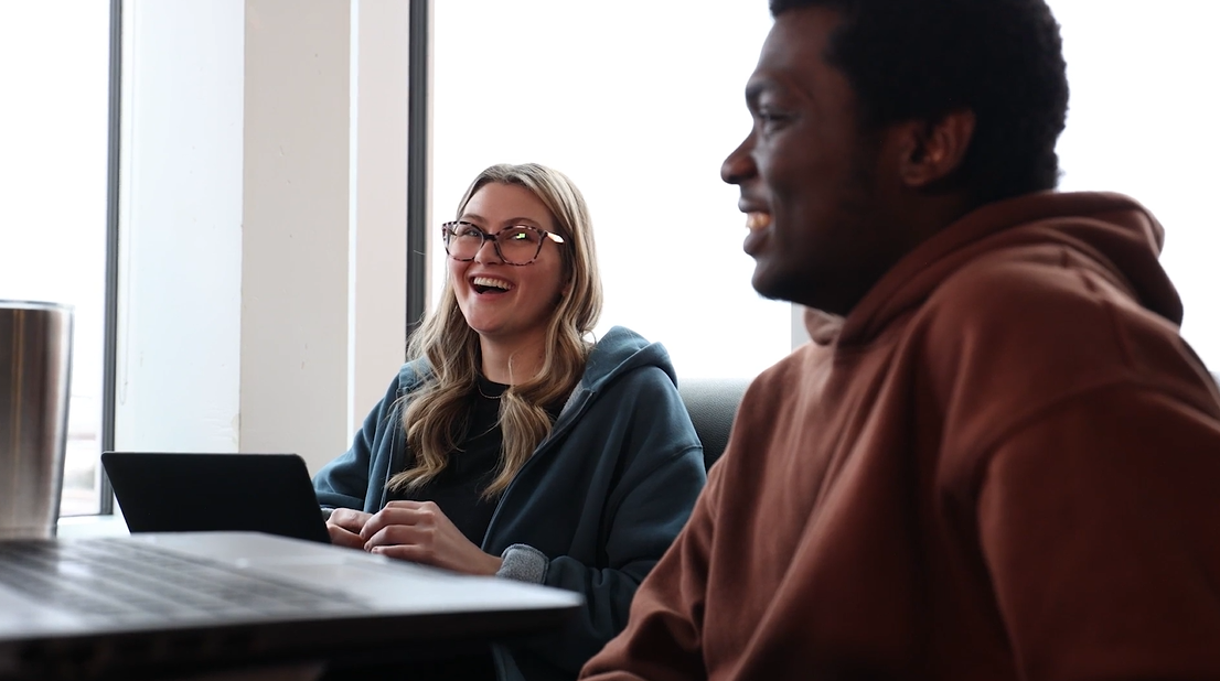 Two students sitting at a table