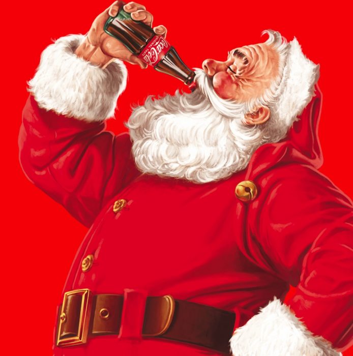 Side profile of Santa Claus drinking a Coca Cola in a glass bottle.