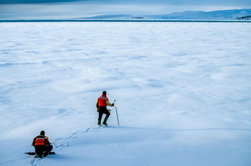 David Babb, lead scientist on Amundsen ship, walking in snow