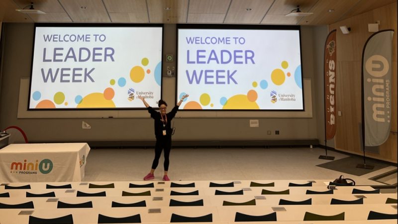 Ashley Gagnon standing at the front of a classroom during Leader week