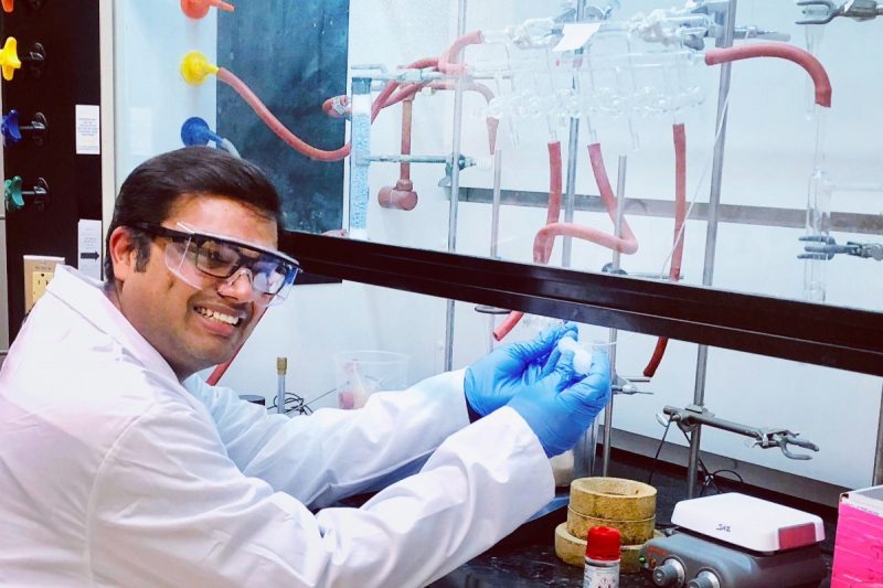 Scientist works in a lab.