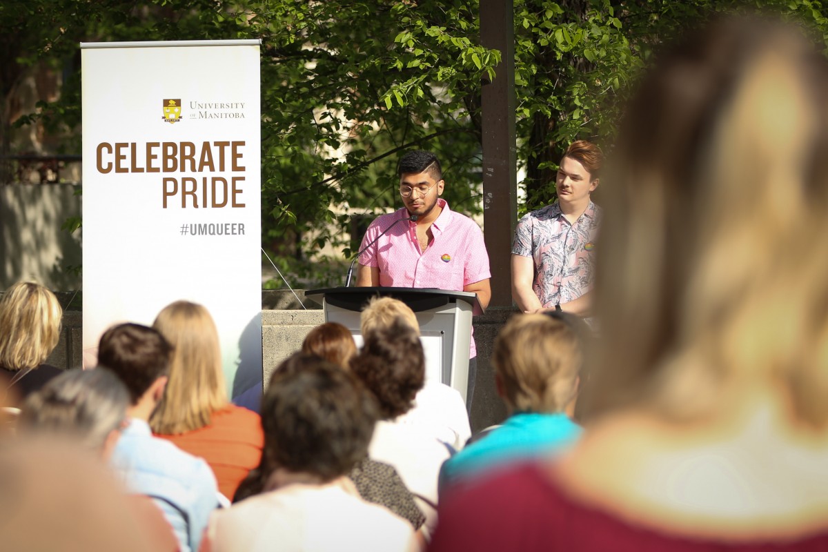 Karan Saxena sharing his story at the 2018 Pride flag-raising ceremony