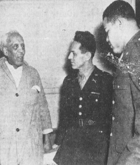 The Winnipeg Tribune 1945 photo shows George St. Pierre Brooks with boxer Joe Louis at Deer Lodge.