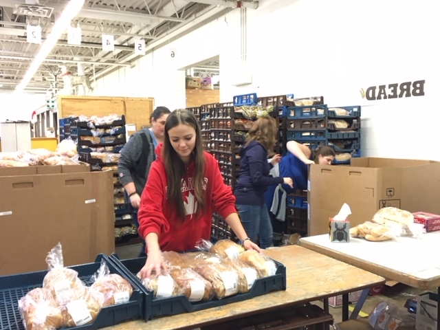 Sarah sorting bread.