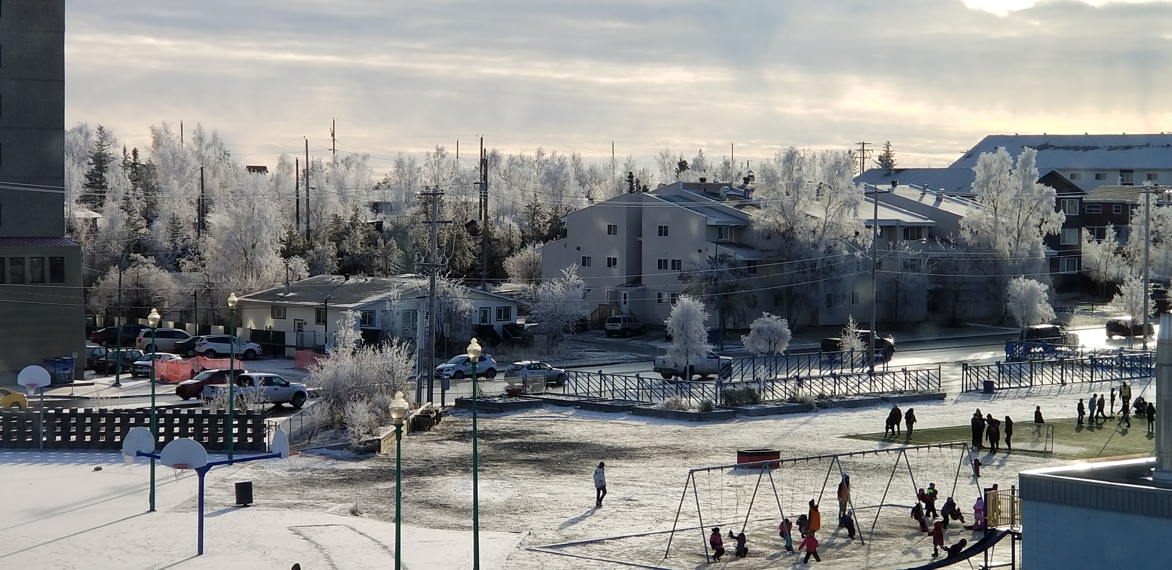View of the Mildred Hall School playground in Downtown Yellowknife from the Stantec office (late November)