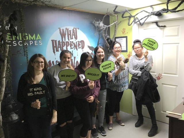 Neechiwakens complete an escape room.