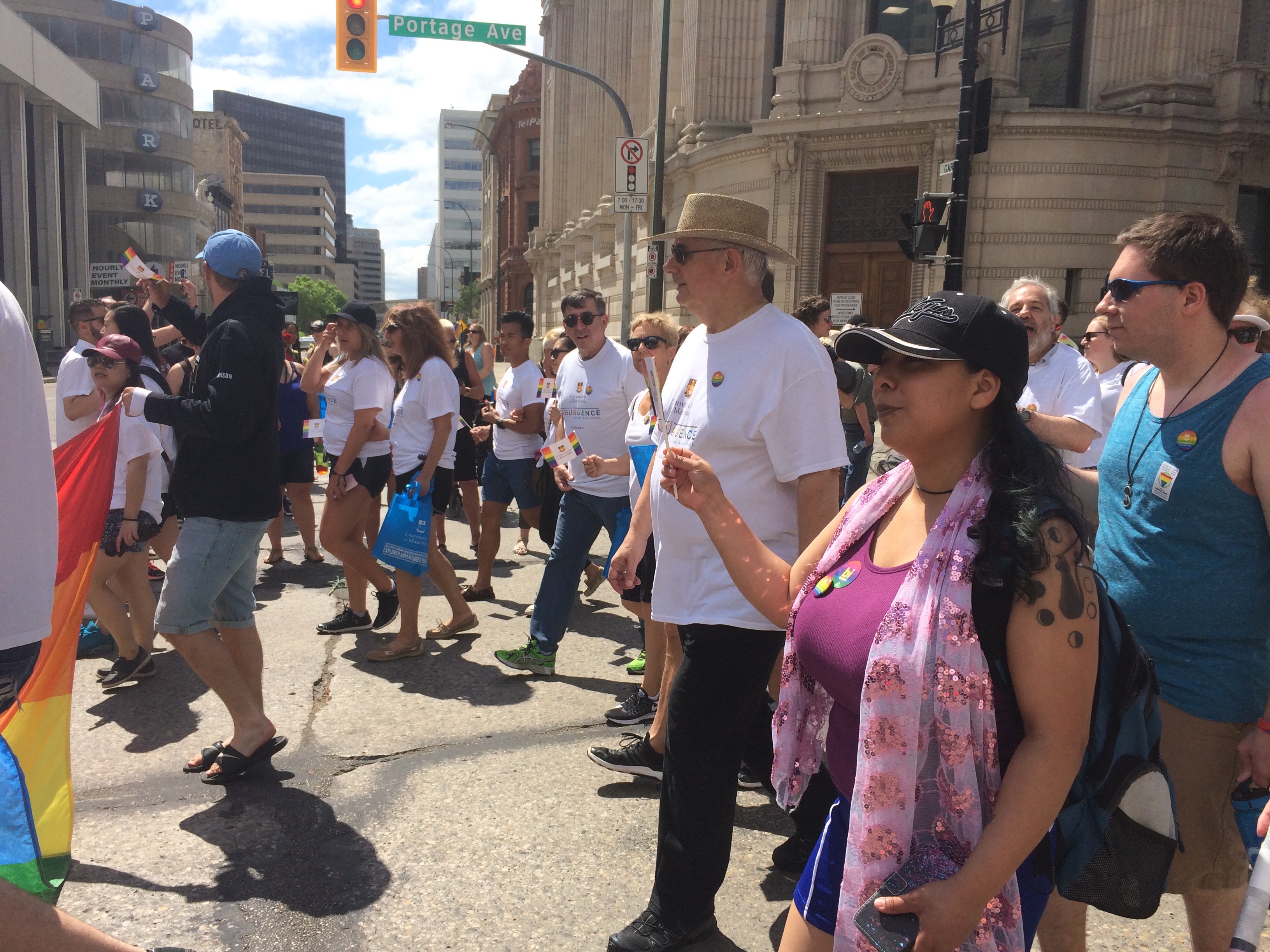 Dr. David T. Barnard, President and Vice-Chancellor, walks with U of M in the Pride parade on June 4.